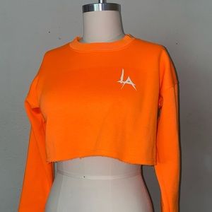 Orange long sleeve crop top